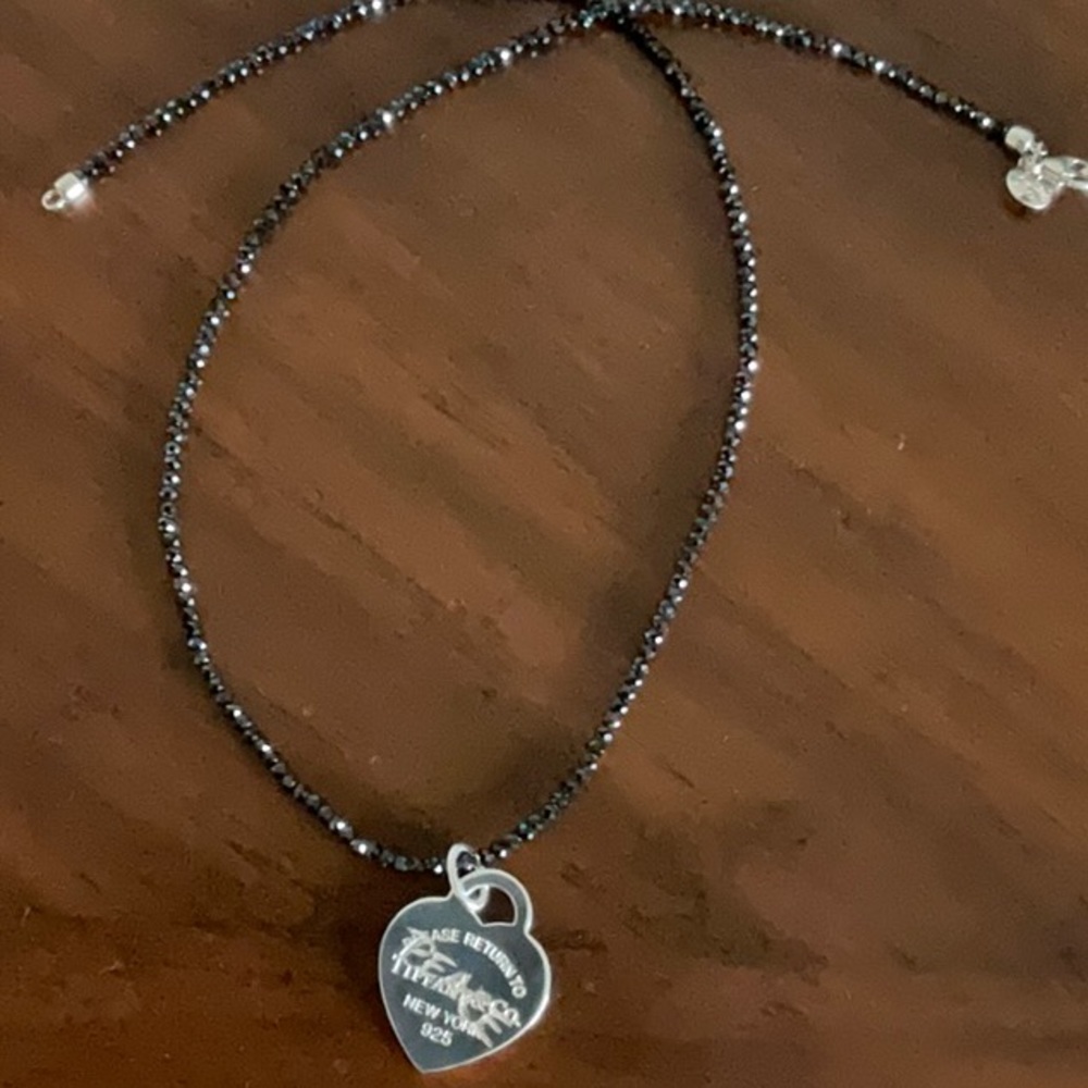 Tiffany Peace etched Heart on a 20” Black Spinel Ziegfeld necklace.